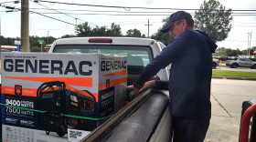 Robert Rink of Pace loads up his generator.