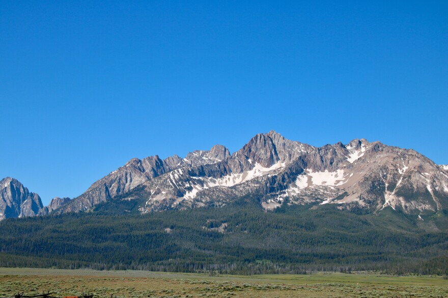 A view of the Sawtooth Mountains on a sunny, blue-sky day. 