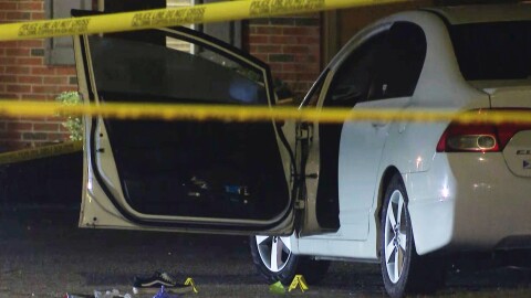 FILE - Law enforcement officers work a crime scene in the Hedingham neighborhood and Neuse River Trail area in Raleigh, N.C., Oct. 13, 2022.