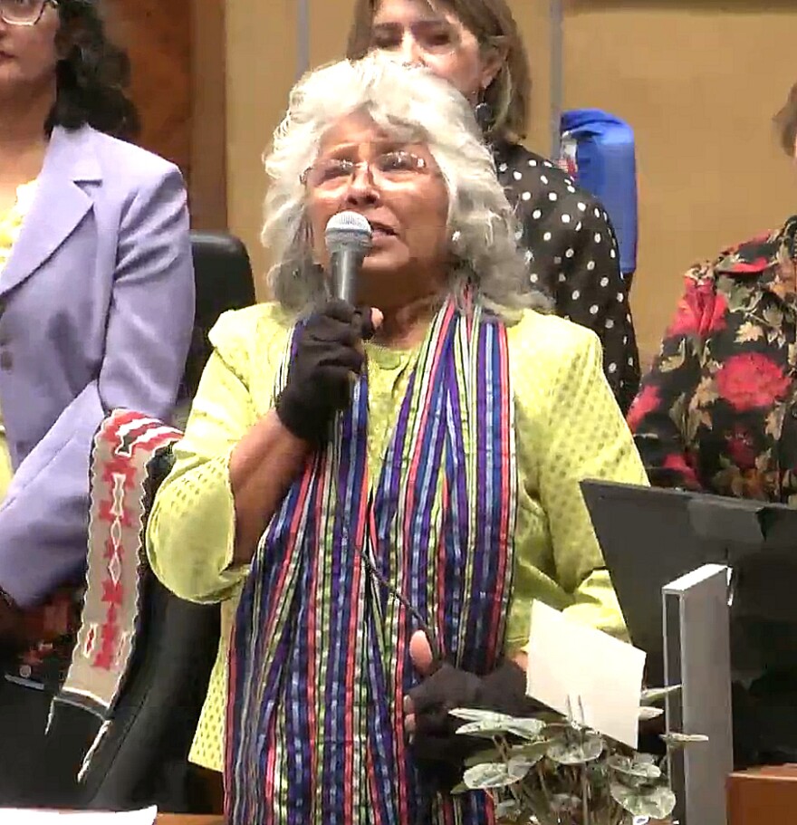 Arizona Sen. Sally Ann Gonzales, wearing the glove her mother wore while picking cotton, lashes out Thursday, March 26, 2026 at Republicans for allowing only a vote to repeal the Cesar Chavez holiday without considering proposals to rename it to honor farmworkers.