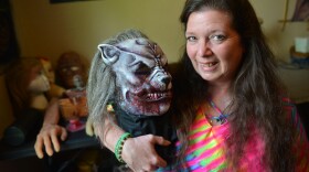 Kansas City makeup and special effects artist Colleen Coffman displays a silicone wolfman she created for a client for CryptiCon KC which launches Friday night.