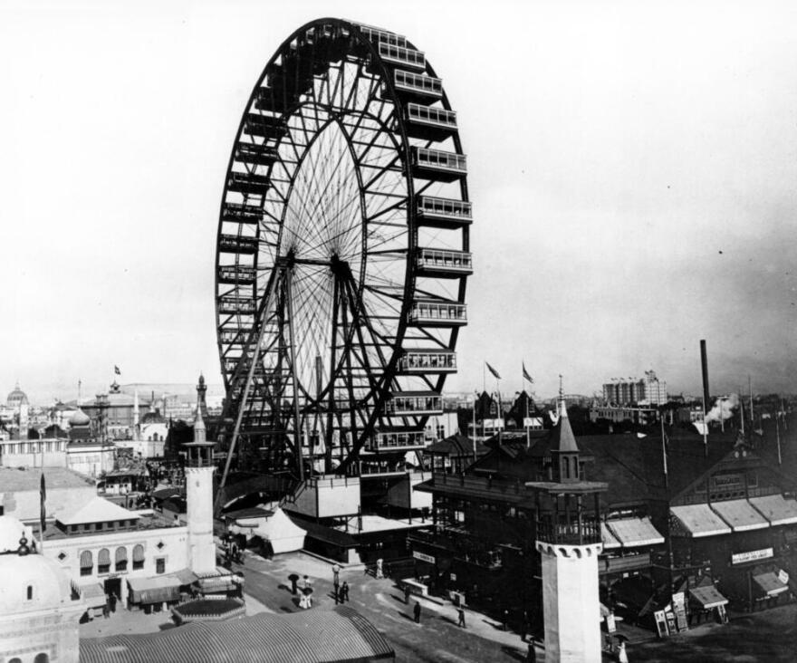 The grounds of the 1893 World's Columbian Exposition in Chicago, Ill., are shown in May, 1893.  The first ferris wheel, which carries 1,400 persons 250 feet into the air, is one of the biggest attractions.  The exposition opened on May 1. (AP Photo)