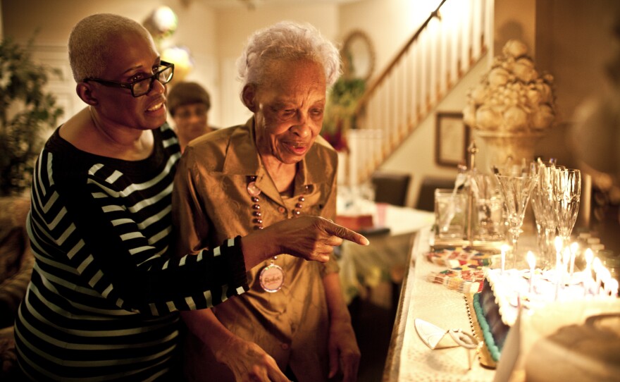 Geneva Hunter (left), who runs the secretarial operations for a Washington, D.C., law firm, decided to take a hands-on approach to her mother's care and moved Ida Christian, 89, into her home in Odenton, Md.