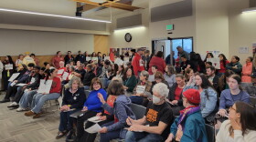 The Springfield School District's board meeting was standing room only Monday night ahead of a budget vote to reduce staffing and cut back dual immersion for older students.