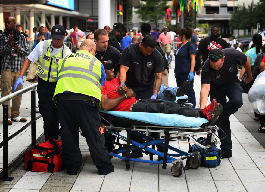 An evacuee is taken to hospital after feeling unwell at the Convention Center which is serving as an evacuation shelter after Hurricane Harvey caused heavy flooding in Houston, Texas on Aug. 30, 2017. (Mark Ralston/AFP/Getty Images)
