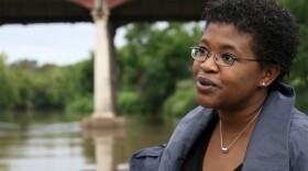 Author Attica Locke talks during a boat ride passing through downtown Houston on Buffalo Bayou.