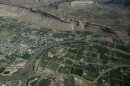 Overhead view of the Colorado River carving through the landscape.