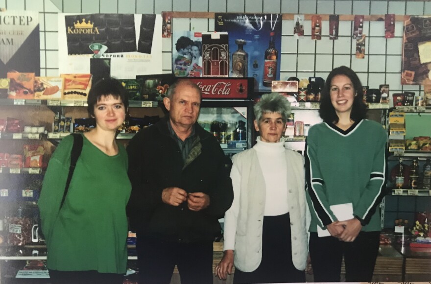 Journalist Katya Cengal (far right) with her translator, Sveta Ionova, and Ionova's parents in Ukraine in the early 2000's.