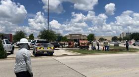 Crews are seen outside Golden Triangle Mall on Wednesday after a gas leak was reported and the mall was evacuated.