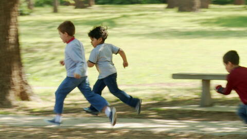 Belonging young boys running