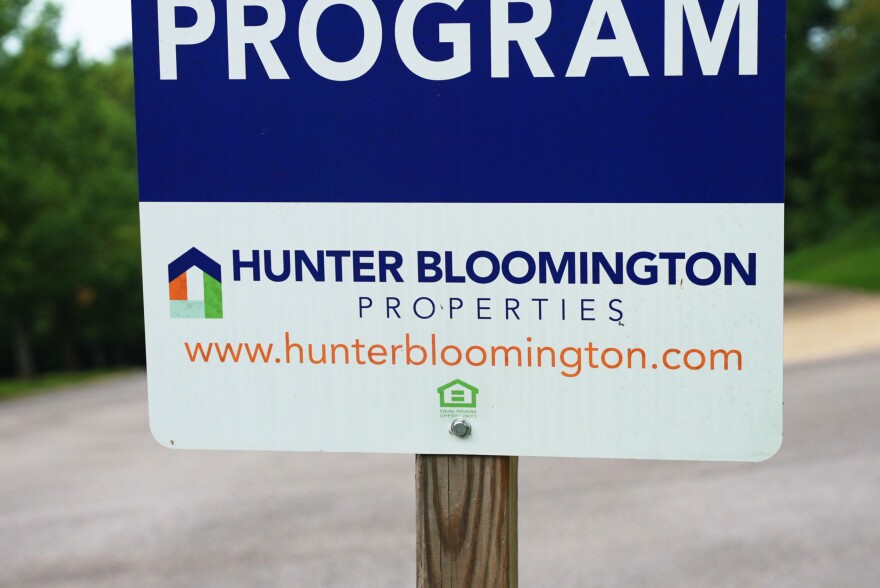 A Hunter Bloomington Properties sign just outside Bloom Apartments