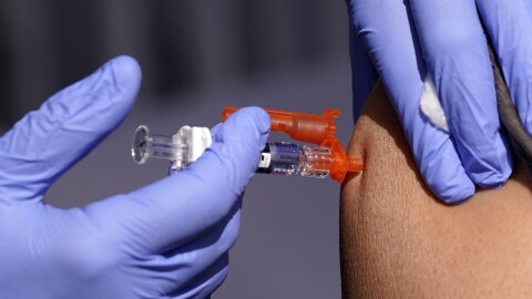 FILE - A patient is given a flu vaccine Oct. 28, 2022, in Lynwood, Calif. On Tuesday, July 2, 2024, the U.S. Department of Health and Human Services announced plans to pay Moderna $176 million to develop a mRNA vaccine to treat bird flu in people, as cases in dairy cows continue to mount across the country. (AP Photo/Mark J. Terrill, File)