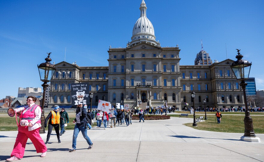 Thousands gathered at the Michigan Capitol in Lansing, Mich., on March 28, 2026, for a No Kings rally.