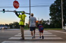The Hickman Mills School District hired a company to staff crossing guards this school year, including at the intersection where Hazen Workman-Duffy was fatally struck by a car.
