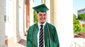 Oscar Romero poses after his graduation from UNC Charlotte in 2017. The uncertainty created by DACA has weighed on him.