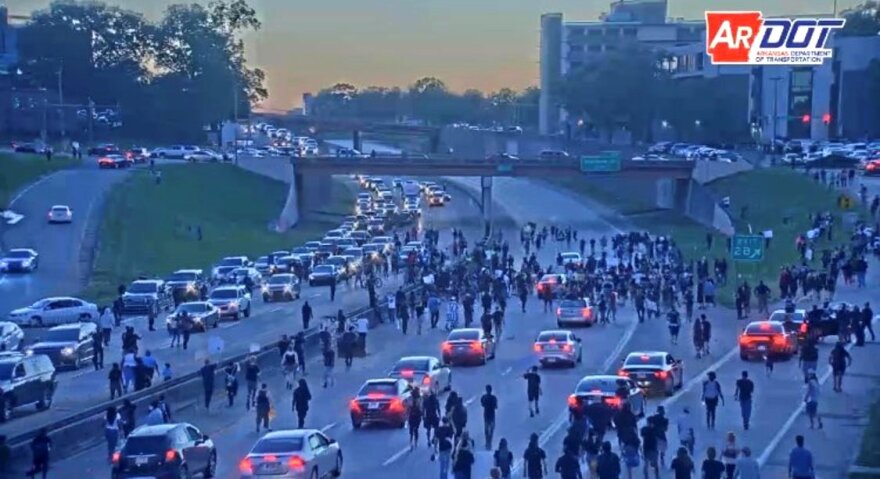 Demonstrators block traffic on Interstate 630 Saturday evening near the Arkansas State Capitol to protest the death of George Floyd in Minneapolis.