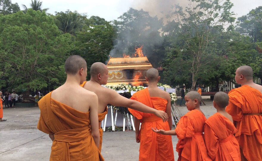 Following Laotian tradition, Vansana and his brother became Buddhist monks for their grandmother's funeral.