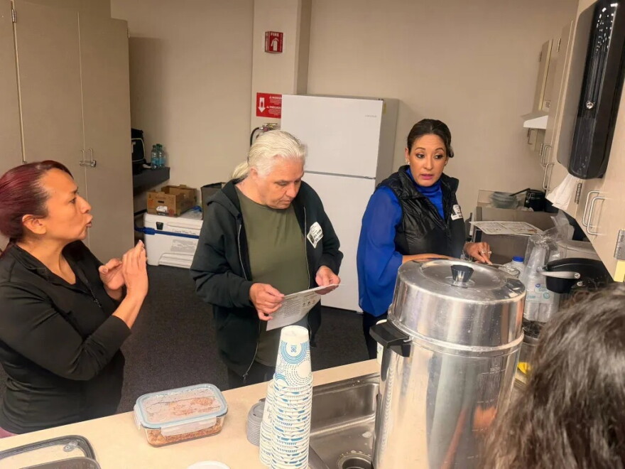 Caregivers of children enrolled in Dodge City’s Comanche Middle School learn how to make licuados — blended smoothies — and ground-turkey-stuffed bell peppers during a Cafecito program focused on healthy eating and nutrition.
