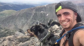 Malcolm and his dog look out over one of many spectacular views along their journey. (Courtesy Malcolm Rene Ribot)