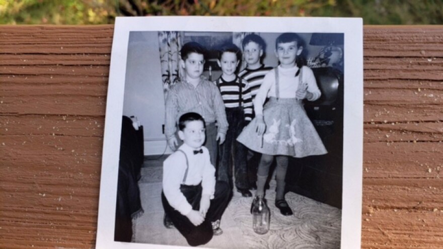 A black and white photograph of children.