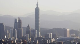 A view of the Taipei skyline with the iconic Taipei 101 skyscraper, the tallest building in Taiwan, in Taipei, Taiwan on Thursday, Dec. 22, 2022. (AP Photo/Chiang Ying-ying)