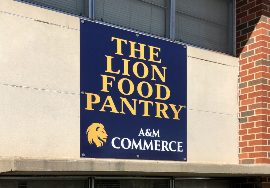 A sign above the food pantry door indicates its location in Craddock Hall.