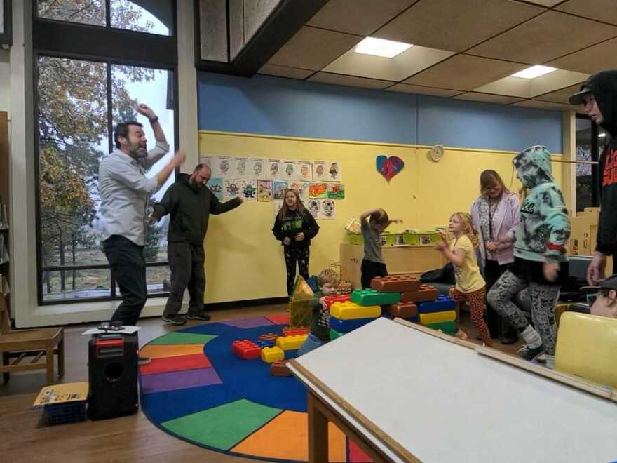 Jon Peoples, children's librarian for the Butte County Library, leads a "silly dance" at a storytime at the Paradise Branch Library on Nov. 18, 2023.