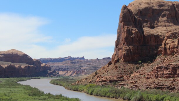The Colorado River flows just west of Moab, UT towards its confluence with the Green River in Canyonlands National Park.