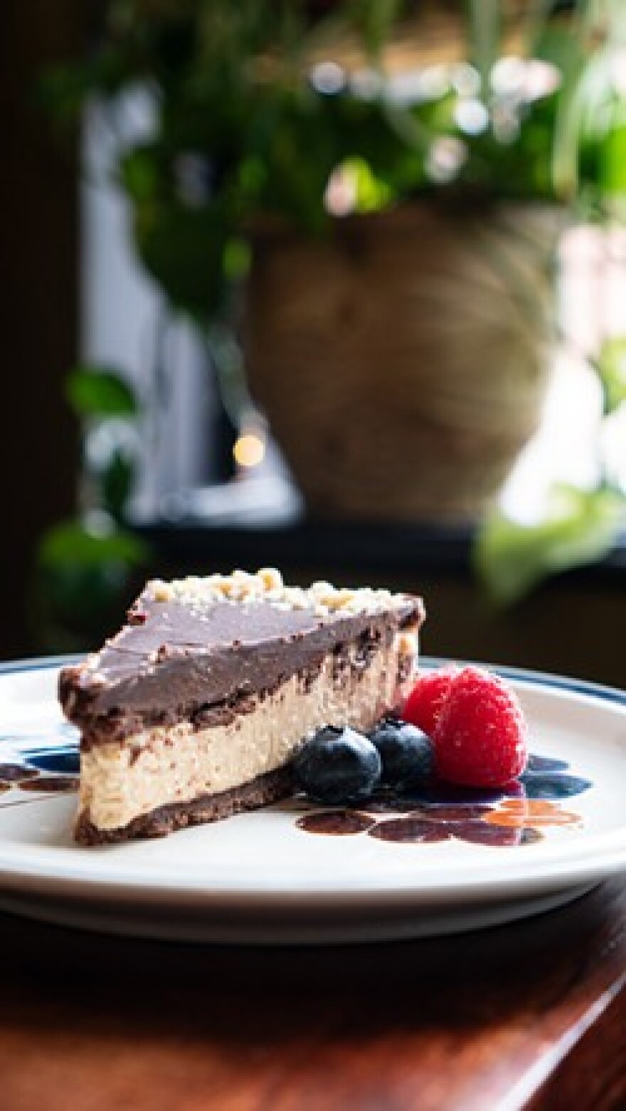 Peanut Butter Pie (peanut butter cream cheese filling, chocolate and graham cracker crust, dark chocolate ganache and crushed peanuts on top).