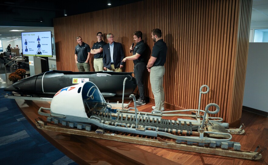 Eastman Kodak Company announces its support of USA Bobsled/Skeleton ahead of the 2026 Winter Olympics, unveiling a new state-of-the-art bobsled in Kodak’s iconic yellow and red at the Golisano Institute for Business & Entrepreneurship. The historic 1956 Bronze Medal–winning “Tyler Sled,” designed and raced by Kodak engineers, was also on display.