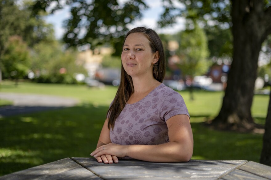 Autumn Crowe, program director of the West Virginia Rivers Coalition, poses in Lewisburg, W.Va., on Thursday, Sept. 1, 2022.