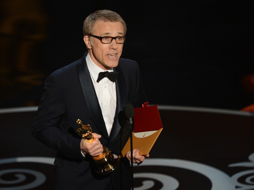 Christoph Waltz accepts the Oscar for best supporting actor in <em>Django Unchained.</em>