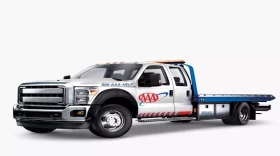  a white tow truck with AAA logo