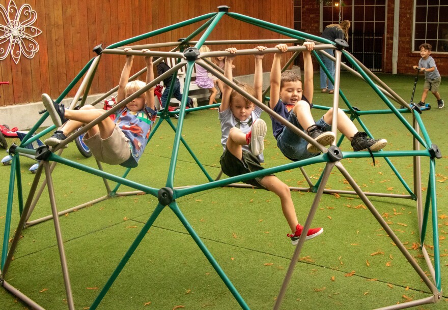 The all-day, intergenerational pre-K class in Guthrie plays outside during recess.