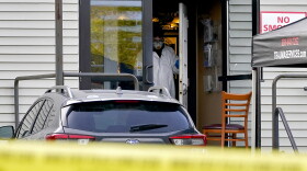A hazmat team works inside Schemengees Bar & Grille, Sunday, Oct. 29, 2023, in Lewiston, Maine. The community is working to heal following shooting deaths of 18 people at the bar and a bowling alley in Lewiston on Wednesday.