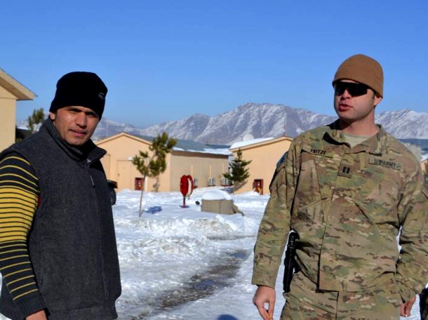 Army Capt. Joe Fritze (right), who trains Afghan police officers in Kabul, works closely with interpreter Gul Agha Shirazi. Fritze says he depends on Shirazi not just to translate, but to warn him if he senses anything suspicious or dangerous.