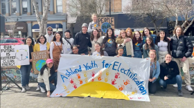 Members of the Ashland Youth for Electrification campaign pose on the Ashland Plaza on March 10, 2023.