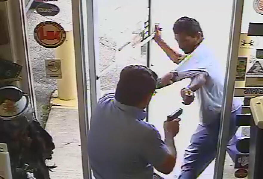 Video released by police show the confrontation between Lakeland City Commissioner Michael Dunn and Christobal Lopez, which ended in Lopez's death outside of Dunn's Army & Navy Surplus store.