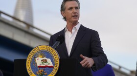 California Gov. Gavin Newsom speaking from a podium.