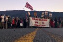 Demonstrators block a road at the base of Hawaii's tallest mountain, in Mauna Kea, Hawaii, on July 15, 2019, to protest the construction of a giant telescope on land that some Native Hawaiians consider sacred.