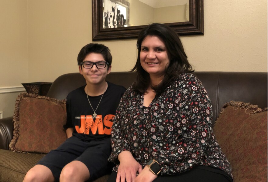 Wes and Lisa Scalf pose for a portrait in their home in Feb. 2019.