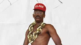 A still image of a cartoon version of Tyler, The Creator with large fists