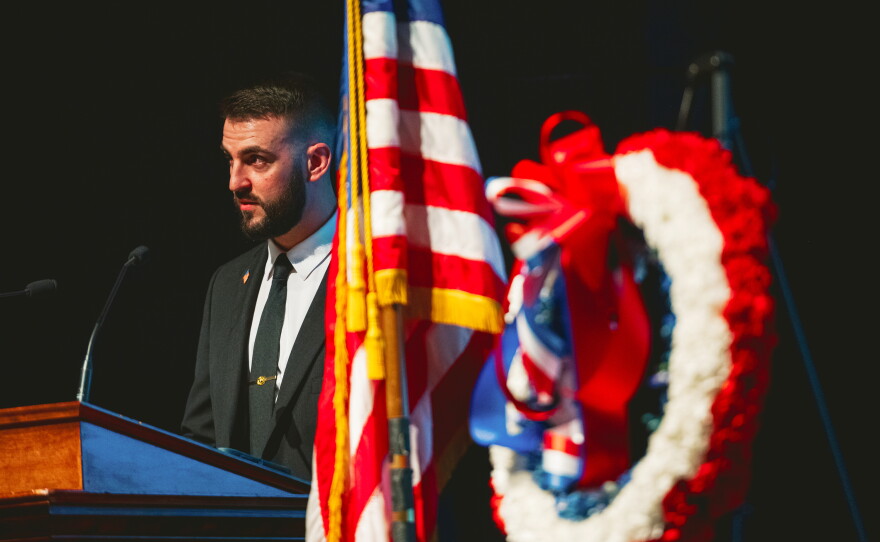 Matt Steinerman, a graduate of Naugatuck Valley Community College graduate and Marine veteran, speaks to the crowd at the school's Veterans Day ceremony.