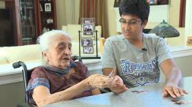 Power of Children award winner Rahil Thanawala works with his grandmother Dayaben Thakker on the Alzheimer's app he developed.
