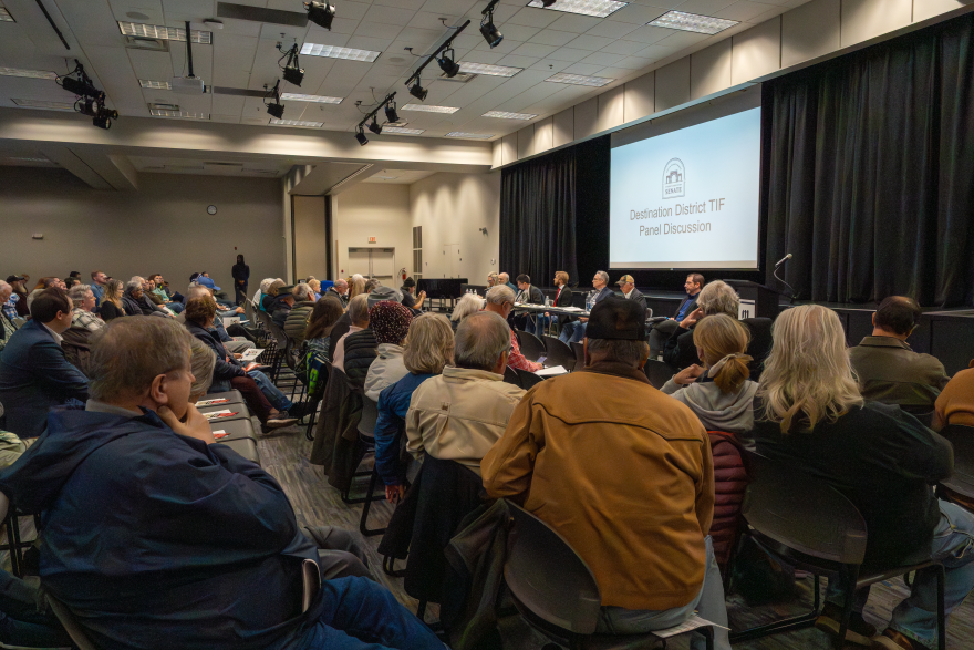  Audience members listen in to a public forum at South Dakota Mines about the upcoming Destination District TIF election.