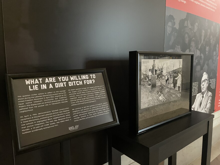 An exhibit in the Relay Cleveland display at Cleveland City Hall asks viewers to put themselves in the shoes of protesters at the Stephen E. Howe construction site that The Reverend Bruce Klunder died at in 1964. It includes dirt from the site in Cleveland's Glenville neighborhood.