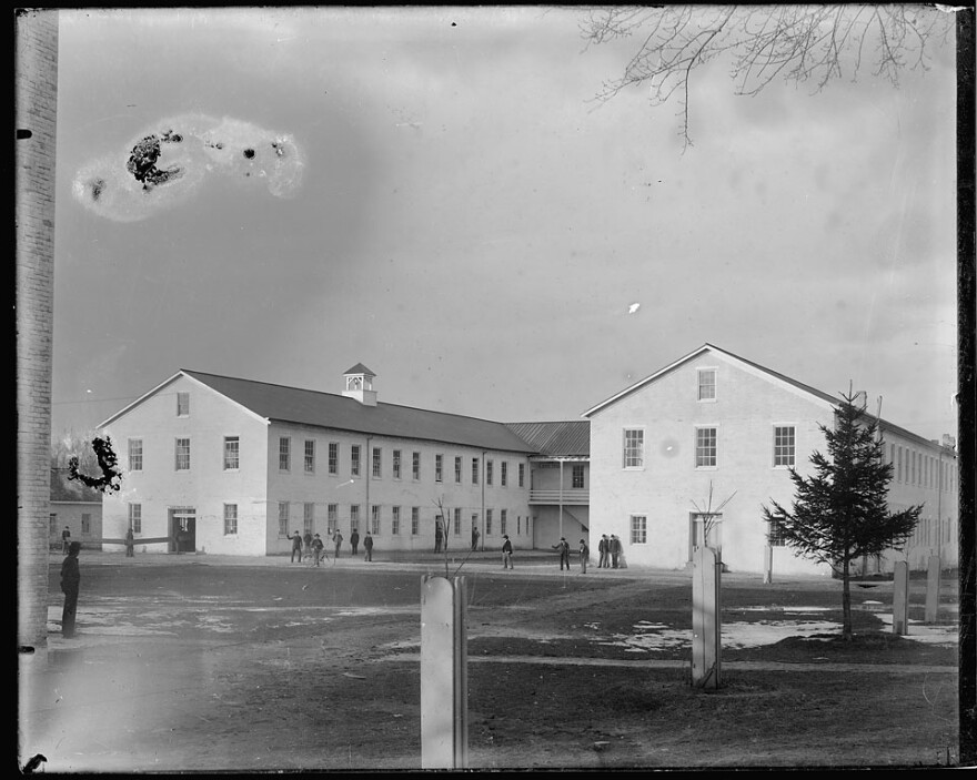 Exterior of school workshops at Carlisle Indian Industrial School, taken in the 1880s