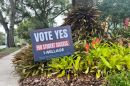 A sign in support of the 1-mill increase outside a home on Frank Lloyd Wright Way.