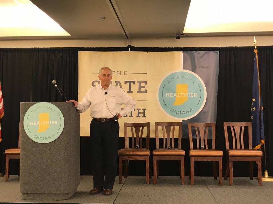 Community Health Network CEO and Alliance Chairman Bryan Mills addresses the State of Our Health summit in Indianapolis.