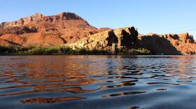 The Colorado River flows past Lees Ferry in Coconino County, Arizona on June 17, 2026. A new plan for managing the shrinking water supply will cut back on the amount that flows to Arizona, California and Nevada.